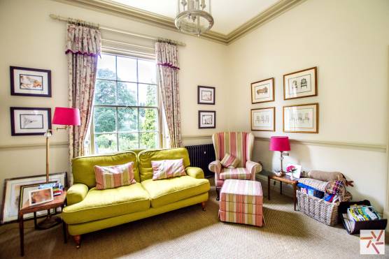 3200N photo shoot location in north yorkshire living room with wooden flooring and feature window