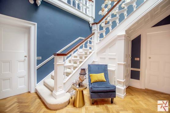 3214W 12 filming location in west yorkshire hallway with feature staircase and wooden flooring