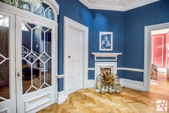 3214W 13 filming location in west yorkshire hallway with feature staircase and wooden flooring