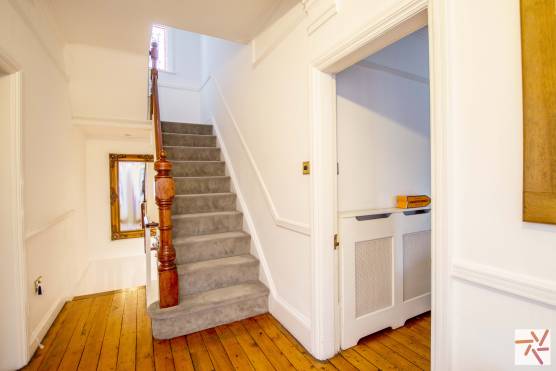 3222M 18 filming location house in Manchester staircase.jpg