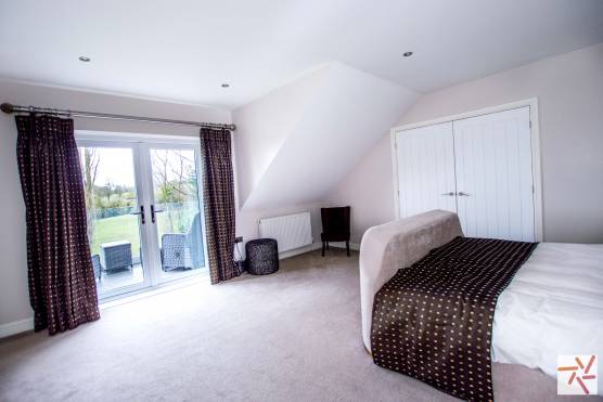 3223C 12 tv commercial location house in cheshire large master bedroom with balcony.jpg