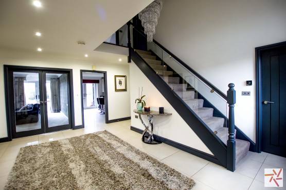 3223C 18 filming location house in cheshire modern staircase and entrance hallway.jpg