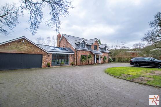 3223C 24 photo shoot location house in cheshire modern home with large driveway and garage.jpg