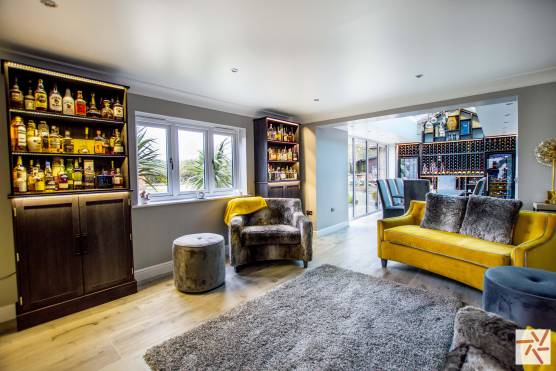 3223C 3 tv drama location house in cheshire modern open plan living and bar area with wine cellar.jpg