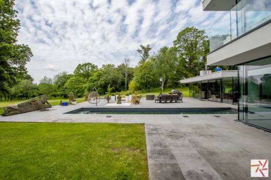 3225C 41 filming location house in Cheshire modern family home with indoor and outdoor swimming pools.jpg