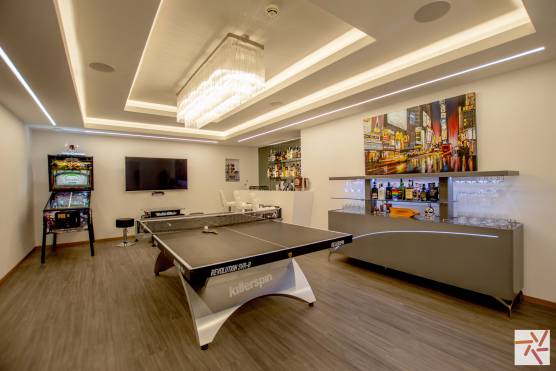 3244C 40 filming location house in Cheshire home stylish bar and table tennis.jpg