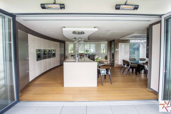 3244C 8 filming location house in Cheshire contemporary kitchen with bi folding doors.jpg