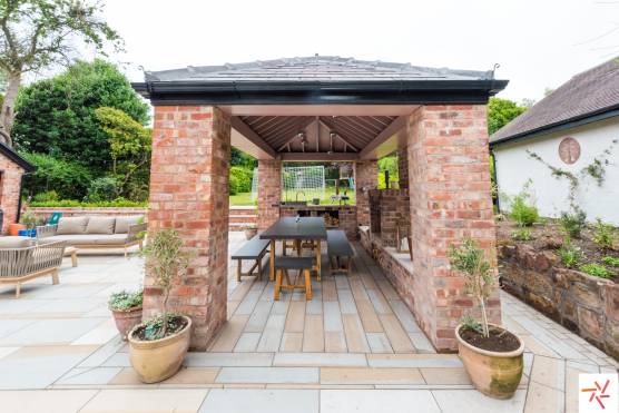 3253L 22 filming location house in Lancashire outdoor living area with pizza oven.jpg