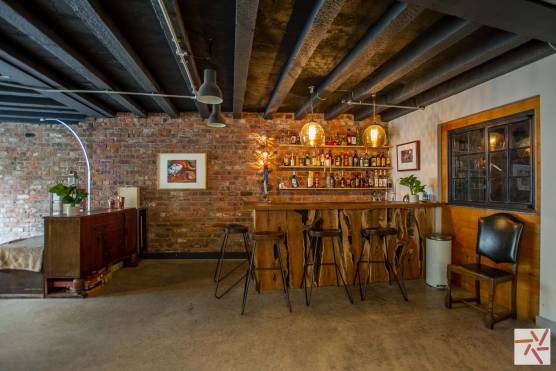 3256C 11 photo shoot location house in Cheshire basement bar area with exposed brick.jpg