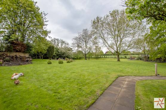 3280C 24 photo shoot location house in Cheshire stunning garden space with paved path.jpg