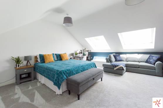 3283W 18 filming location house in West Yorkshire contemporary bedroom with slanted ceiling