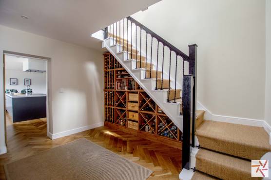 3289W 19 tv commercial location house in West Yorkshire staircase with wine cellar.jpg