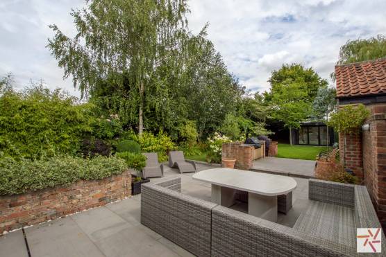 3291N 31 filming location house in North Yorkshire country garden with seating area.jpg