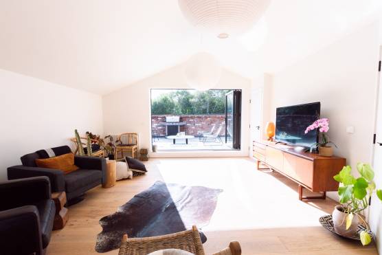 3299M 8 tv advert location house in Manchester living room with roof terrace.jpg