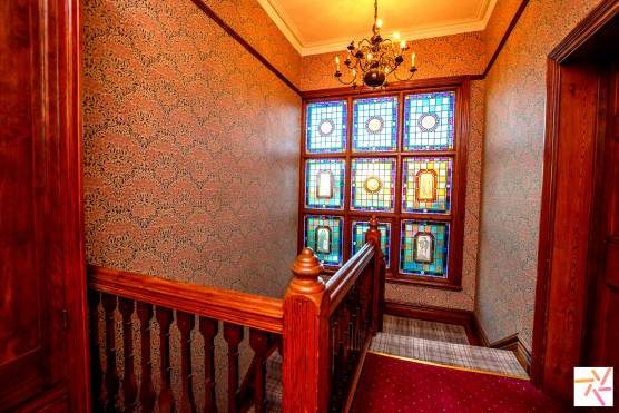 3320C 16 photo shoot location house in Cheshire period property stained glass window on staircase