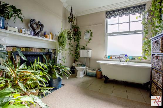 3332M 15 tv shoot location house in Manchester large bathroom with roll top bath and shower