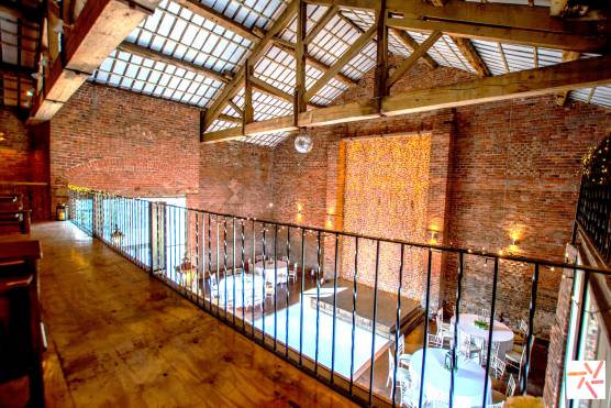 3338M 2 photo shoot location in Greater Manchester large barn conversion event space with exposed brick and beams.jpg