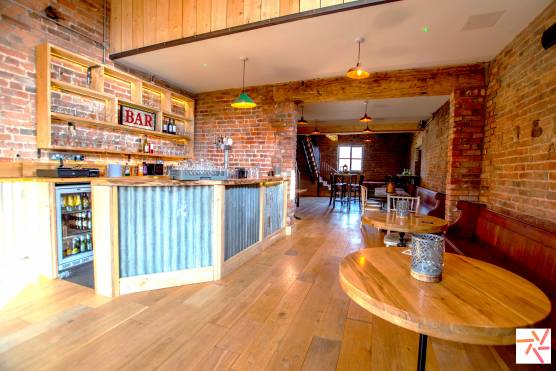 3338C 7 filming location space in Manchester private bar area with exposed brick.jpg