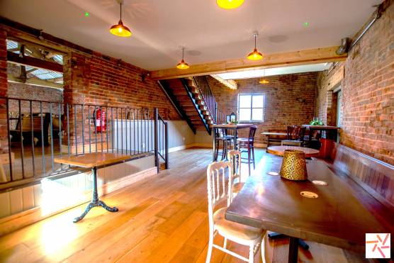 3338M 8 tv commercial location space in Manchester bar area with exposed brick.jpg