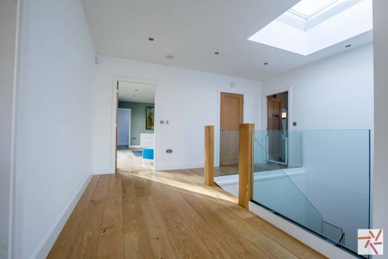 3336M 19 tv commercial location house in Manchester modern staircase and hallway.jpg