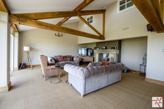 3347C 5 tv shoot location house in Cheshire family living room with exposed beams.jpg