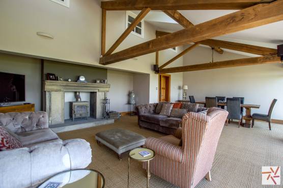 3347C 6 photo shoot location house in Cheshire family living room with exposed beams.jpg