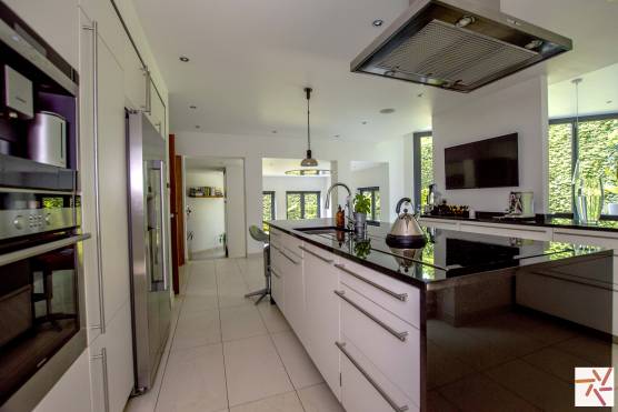 3351C 11 tv commercial location house in Cheshire open plan white kitchen.jpg