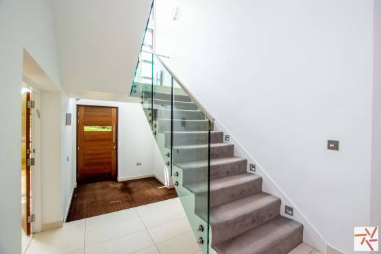 3351C 15 filming location house in Cheshire contemporary family home staircase.jpg