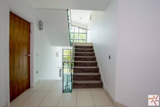 3351C 27 tv drama lcoation house in Cheshire contemporary family home staircase.jpg