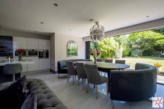 3354C 7 tv shoot location house in Cheshire modern open plan kitchen with doors to garden