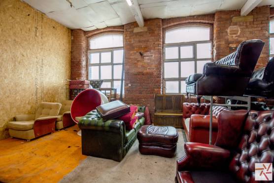 3360M 7 filming location in Greater Manchester warehouse with exposed brick and windows