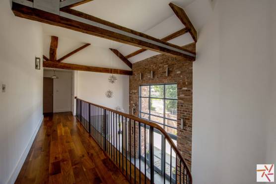 3358C 16 tv commercial location house in Cheshire large landing with wooden floors and beams