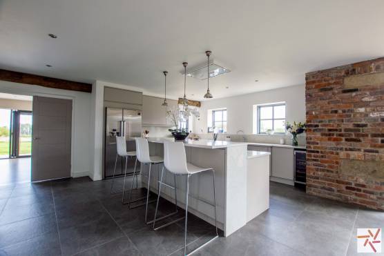 3358C 3 tv shoot location house in Cheshire open plan kitchen with exposed brick