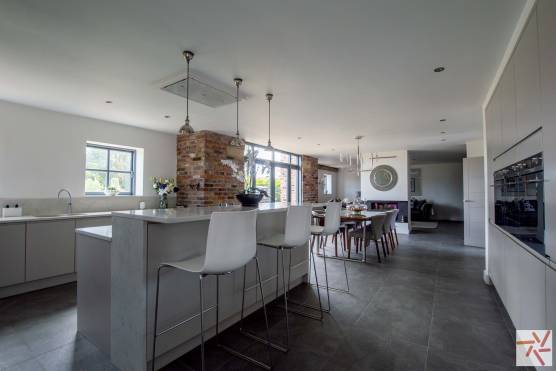 3358C 4 tv commercial location house in Cheshire open plan kitchen with exposed brick