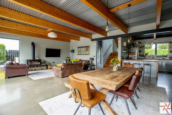 3362N 2 filming location house in North Yorkshire open plan kitchen and living area with wooden beams and corrugated ceiling.jpg