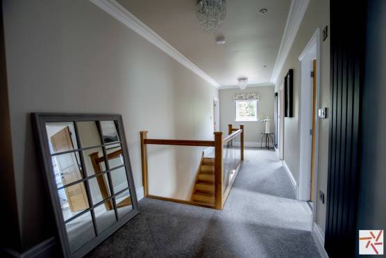 3370C 18 tv shoot location house in Cheshire modern family home staircase and hallway