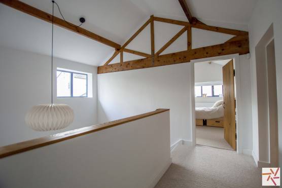 3369C 19 tv commercial location house in Cheshire stylish family home staircase with wooden beams