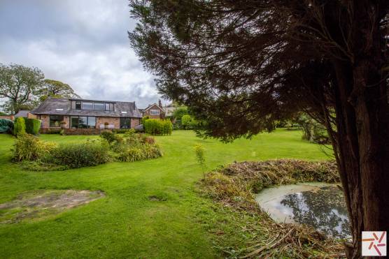 3369C 25 filming location house in Cheshire stylish family home with large garden and pond