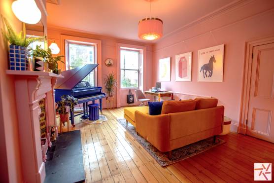 3377C 2 tv shoot location house in Cheshire pink living room with a statement blue piano