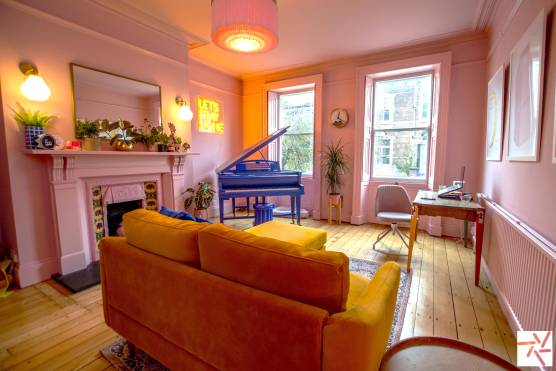 3377C 3 tv drama location house in Cheshire pink living room with a statement blue piano