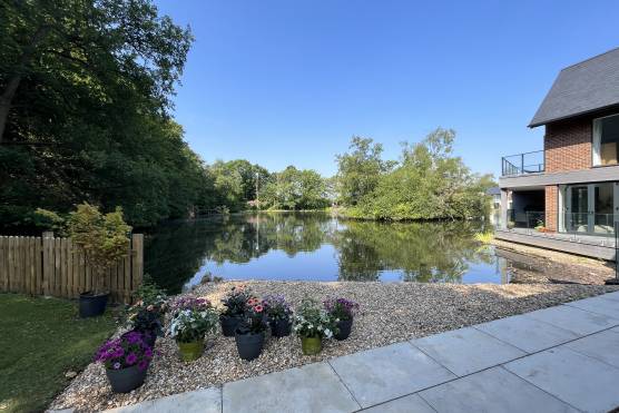 3418C 21 filming location house in Cheshire contemporary home overlooking private lake.JPG