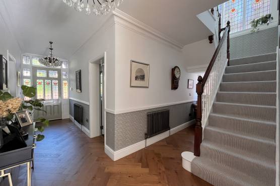 3431M 18 tv drama location house in Manchester large hallway and staircase