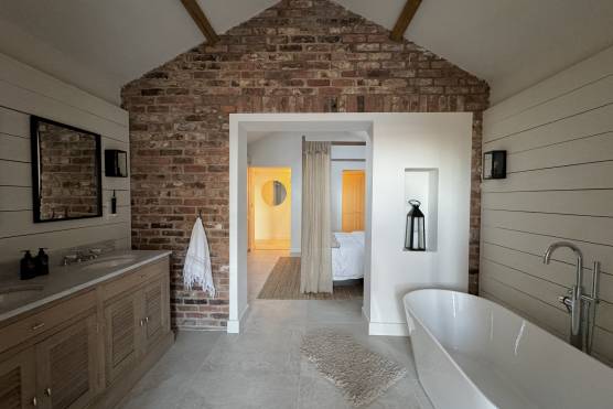 3454N 20 photo shoot location house in North Yorkshire stylish bathroom with exposed brick.jpg