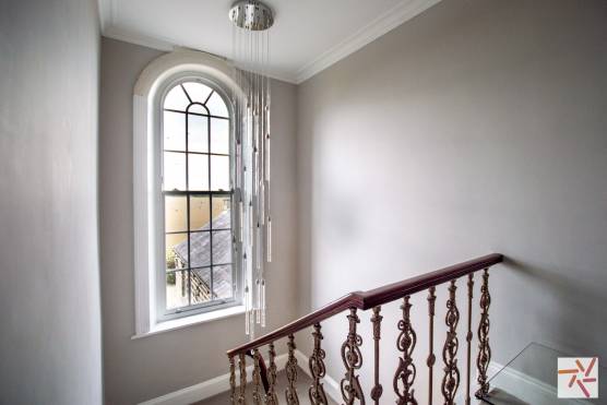 3461W 27 film location house in west yorkshire elegant staircase.jpg