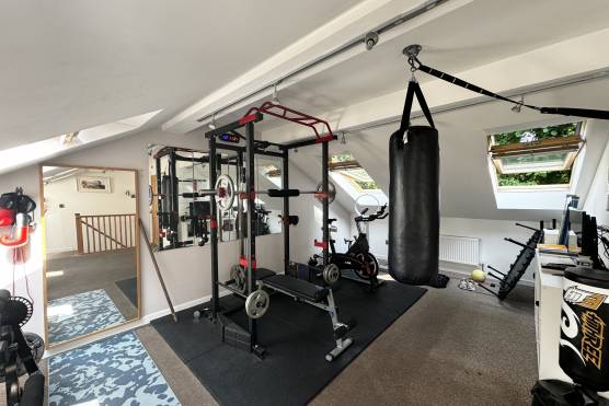 3486M 48 filming location house in Bolton home gym.jpg