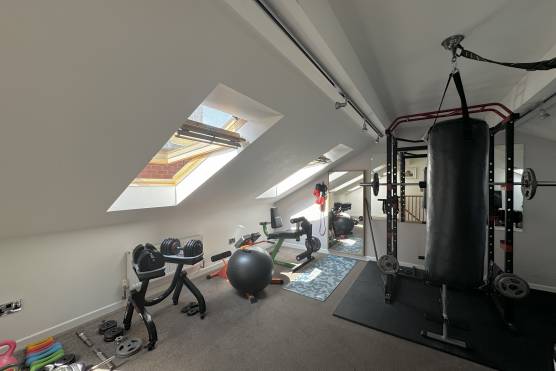 3486M 49 filming location house in bolton home gym.jpg