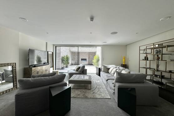 3487M 10 filming location house in Manchester contemporary basement living room.jpg