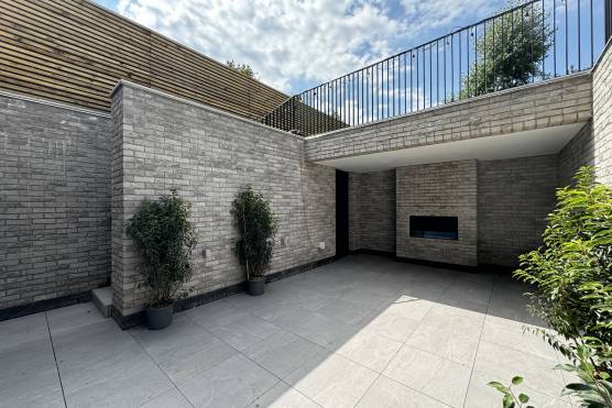 3487M 43 tv drama location house in Manchester basement patio area.jpg