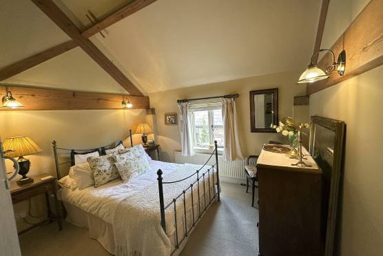 3492C 12 photo shoot location house in Cheshire bedroom with exposed beams.jpg