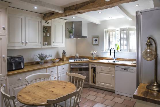 3492C 4 tv commercial location house in Cheshire traditional kitchen with exposed beams.jpg